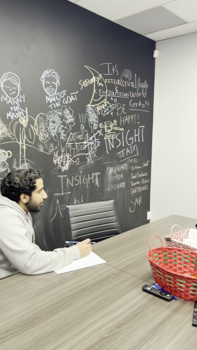 Professional conference room at Insight Accounting CPA in Mississauga with team member working on tax planning